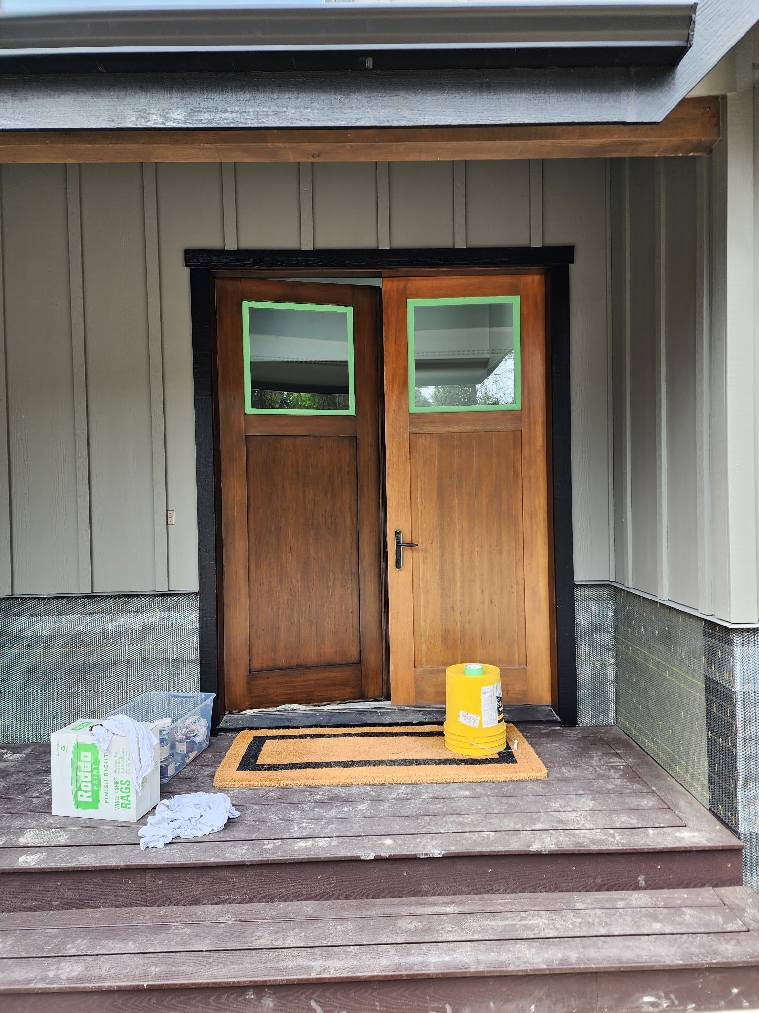 Deck staining work that highlights the natural wood grain.