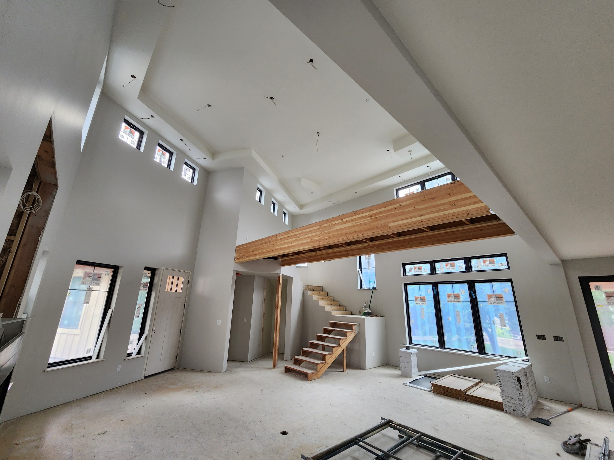 Large exterior repaint with rich siding colors and contrasting trim.